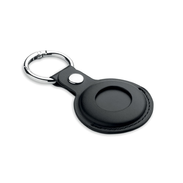 Svart MiLi Lifemate Life Tag Duo smart tracker i vitt PU-fodral med silverfärgad nyckelring, sedd snett framifrån.